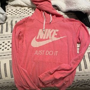 Bright pink Nike hoodie